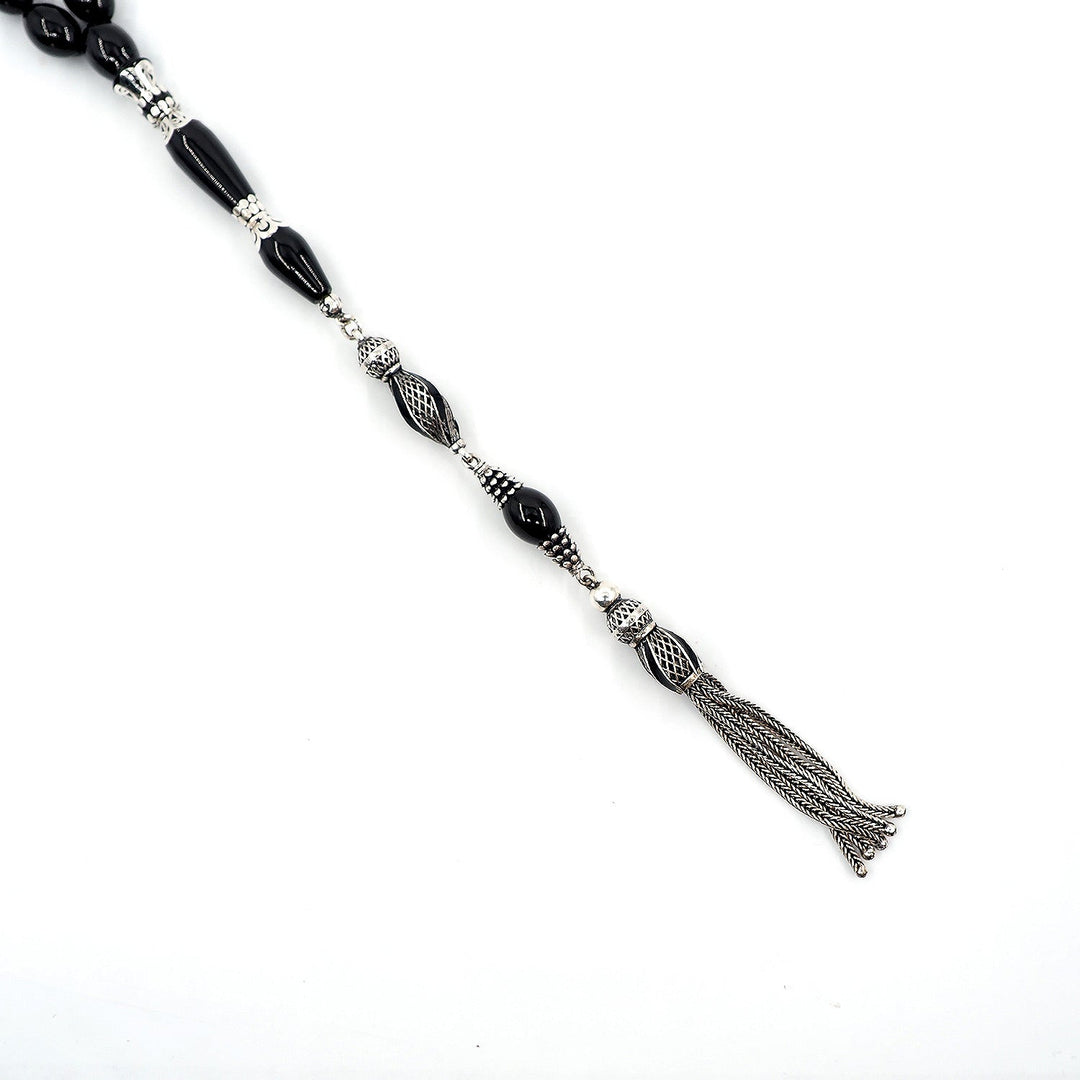 Premium Oltu Stone Tasbeeh Featuring Oval Cut Beads & Silver-Engraved Tassel – WATD402