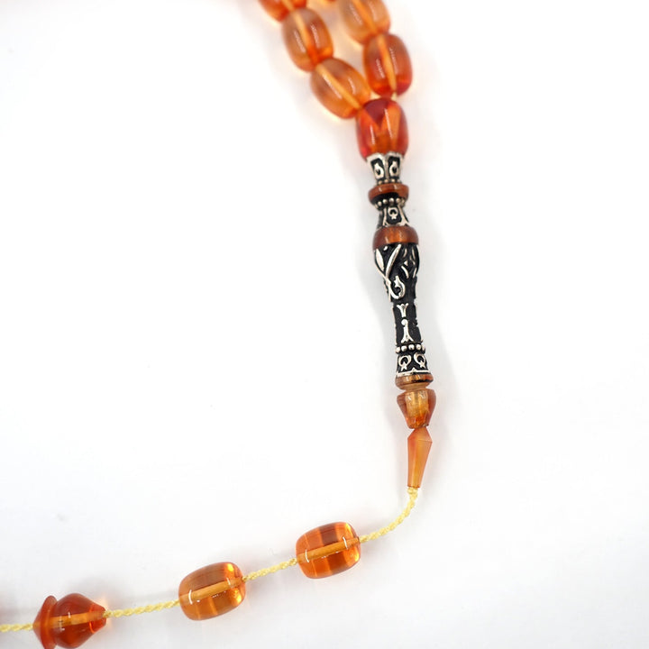 Handcrafted Fire Amber Tasbeeh (New Material) with Silver Engraved Nakkash Imam Bead – WATD403